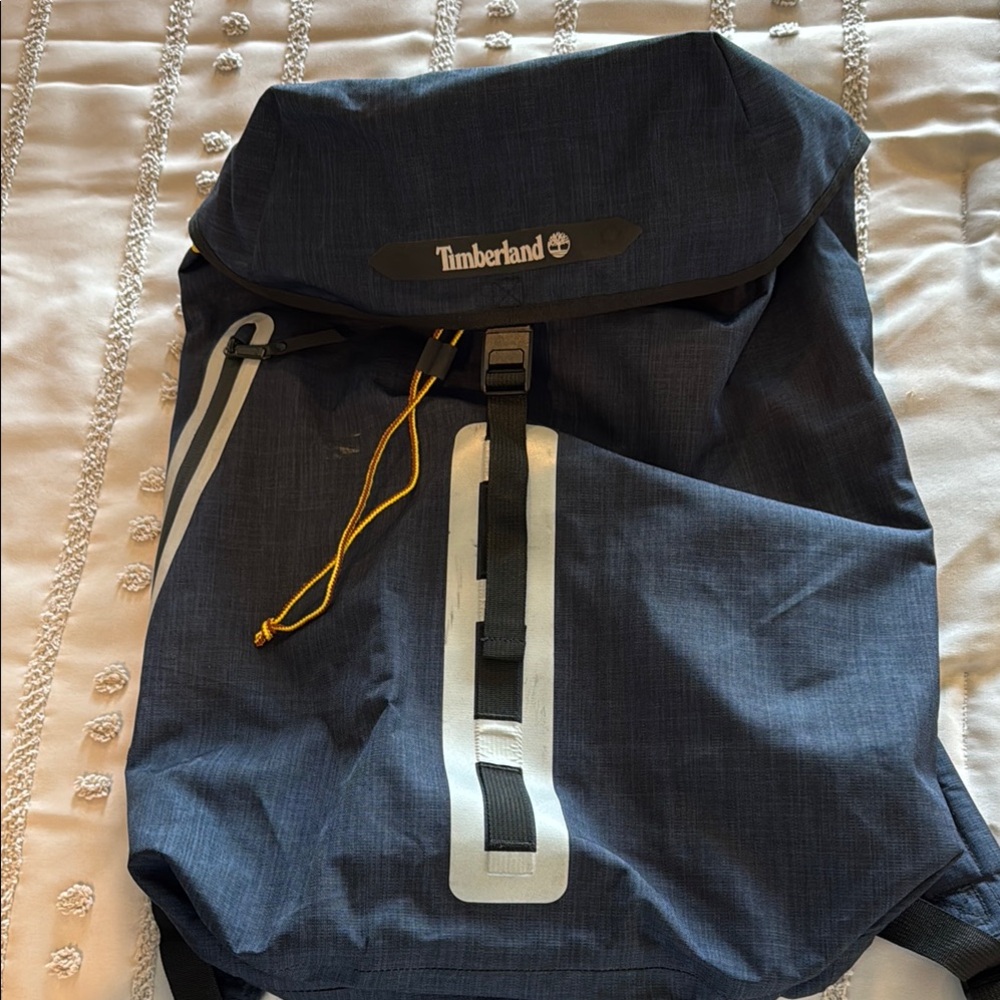 Timberland Blue and Black Backpack with Roll-Top Closure